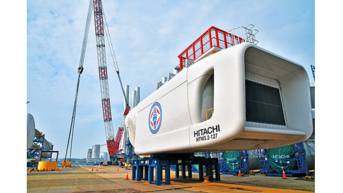 台電離岸風電一期於2018年公開招標，日商日立(Hitachi)將負責21座發電量5.2MW的下風向型風機的製造、組裝、運行和維護等相關作業。
&nbsp;