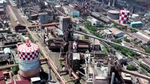 榮工處共完成中鋼建廠第二階段土木工程十六個工場以及以後再追加之東區場區道路、軋輥再硬化設備基礎、扁鋼胚露儲區土木工程等項，第二階段程施工面積廣達90餘公頃，均先後於1982年6月全部完工。【圖/第二階段程施工面積廣達90餘公頃】